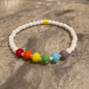 6”-6 1/4”wrist. 6mm Rainbow 4mm white fire-polish glass bead stretch bracelet.